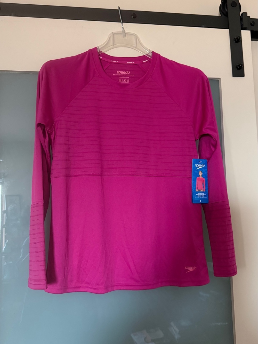 NWT’s Speedo Bright Magenta Long Sleeve Swim Top 
Size L UFP 50